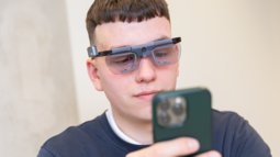 Student on telephone with special glasses on