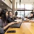 Students working on their laptops
