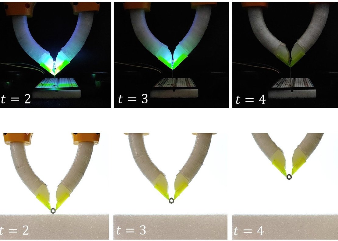 Soft robotic finger with rigid nails can grip small, hard-to-hold objects. The nail and soft finger are bonded through a fibrous 3D-printed structure created by underextrusion.