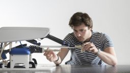 Biomedical Engineering student working on the development of a medical device.