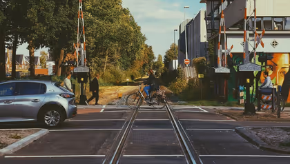 Person riding a bicycle on streets of Enschede