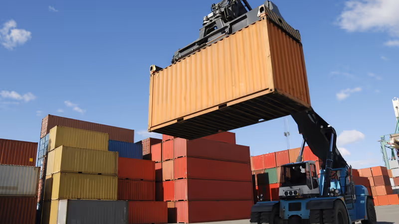 Truck moves containers